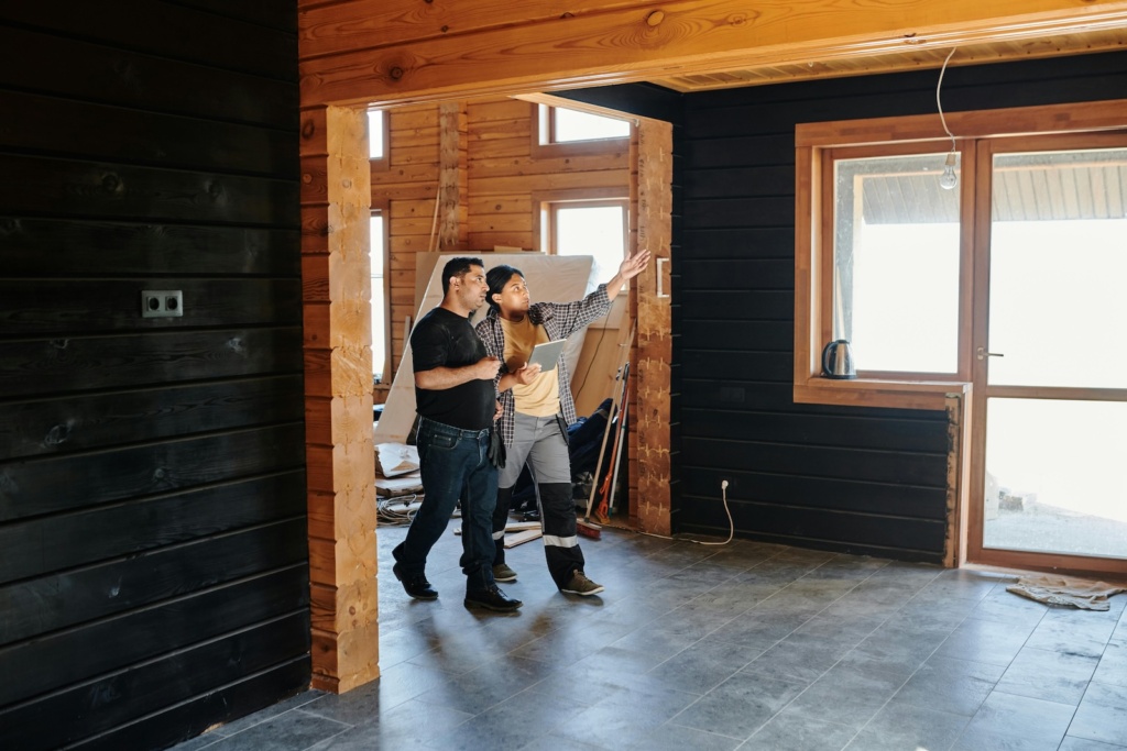 Two people checking on a construction project.